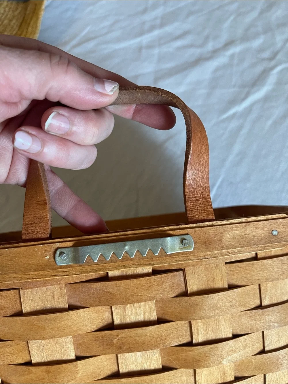 Longaberger woven basket in warm tan
